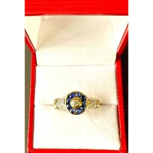 Yellow Gold Ring With Cabochon Sapphires Centered On A Diamond