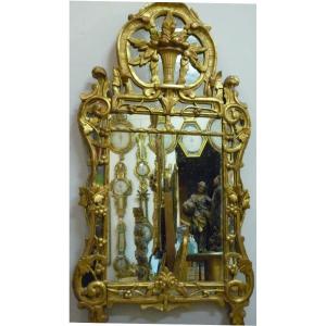 Louis XV Period Mirror In Carved And Gilded Wood