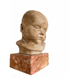 Terracotta Head Of A Sleeping Child. Terracotta. 20th Century French School.
