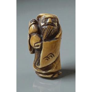 Signed Netsuke Depicting A Meditating Sage, Japan, Late Edo Period, 19th Century