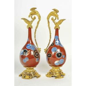 Pair Of Japanese Porcelain And Gilt Bronze Ewers 