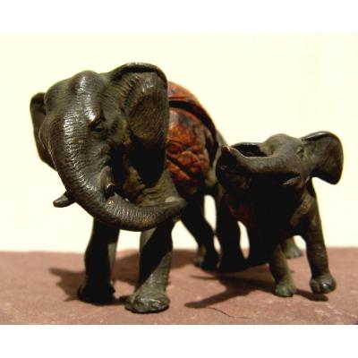 Bronze And Nuts : Elephant And Its Small