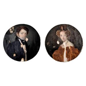 Medallion Portraits Of A Distinguished Scholar And His Wife