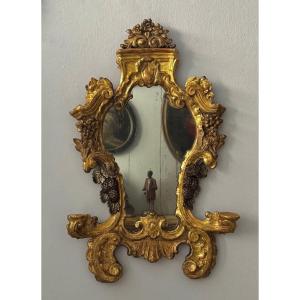 Specchiera lombarda in legno dorato con candelabro - periodo XVIII secolo