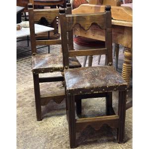 Pair Of Leather-seated Chairs