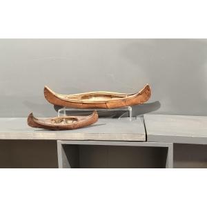Two Small Canoes In The Northwest United States 