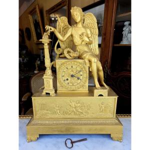 Large Gilt Bronze Clock From The Empire Period In Perfect Working Order.