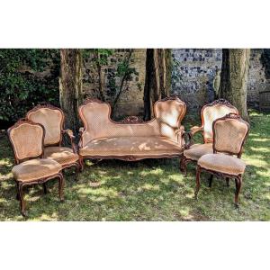 A Five-piece Period Napoleon III Living Room Set In Rosewood And Its Table.