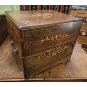 A Charles X Period Liquor Cabinet In Rosewood With Light Wood Trim.
