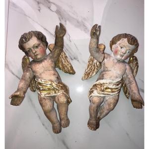 Coppia di putti policromi del XIX secolo 