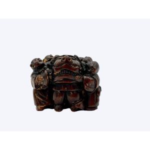 Wooden Buddhist Lion Netsuke