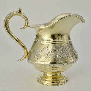 Russia, Circa 1900.  Gilded Silver Milk Jug.