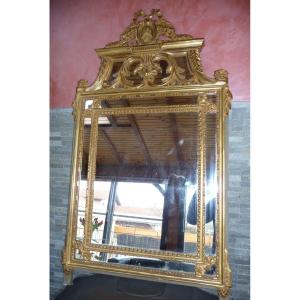 Large  Mirror In Golden Wood, With (beads) In Louis XVI Style.