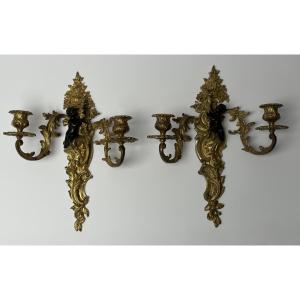 A Beautiful Pair Of Gilt Bronze Wall Sconces Depicted With Cheek Teen In The Louis XV Style