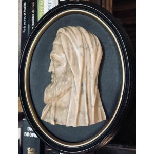 Profile Of A Man Sculpted In 19th-century Marble