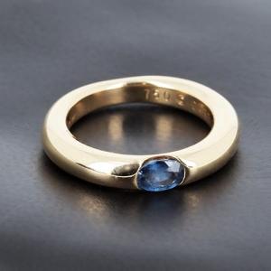 Cartier Ring In 750‰ Yellow Gold, "ellipse" Model, Set With An Oval Sapphire - B10535