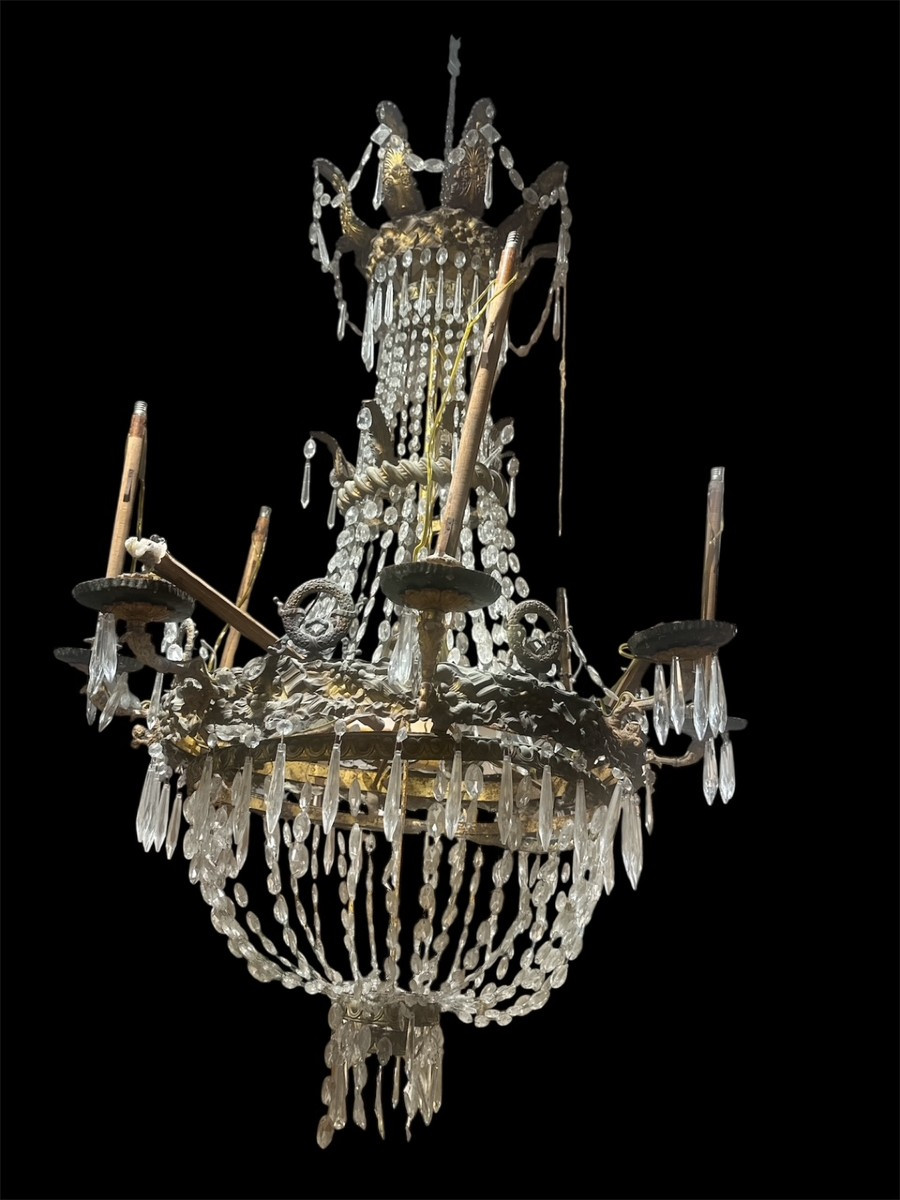 Tre Lampadari in rame sbalzato, bronzo, e dorato  al mercurio.