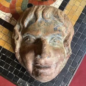 Bas Relief Of A Young Man's Head