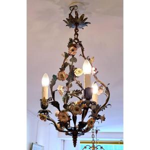 Cage Chandelier Decorated With Branches And Flowers