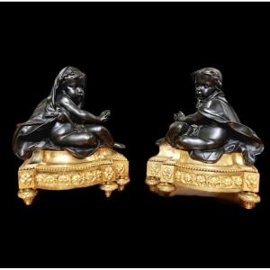 Pair Of Bronze Andirons With Double Patina, Chilling Putti, France, 19th Century, Napoleonic Period