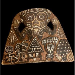 Carved Board With Spirit Figures