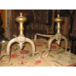 Pair Of 17th Century Andirons Chiseled With Fleur De Lys.