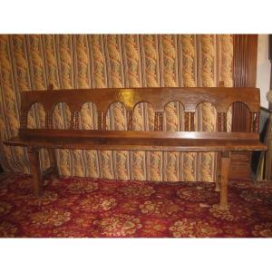 17th Century Walnut Bench With Arcades And Small Columns.