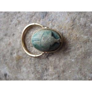 Ring With Scarab With Tilting Hieroglyphic Inscription Mounted In Gold.