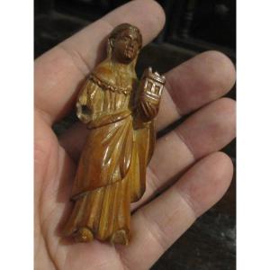 Santa Barbara. Sculpture From The 13th Or 14th Centuries. Transition From Romanesque To Gothic