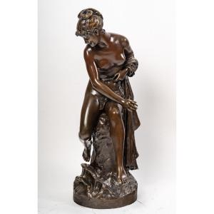 Sculpture Representing A Woman Sitting On A Rock By Léon Pilet