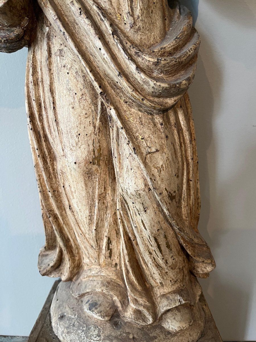Scultura lignea raffigurante evangelista-photo-1