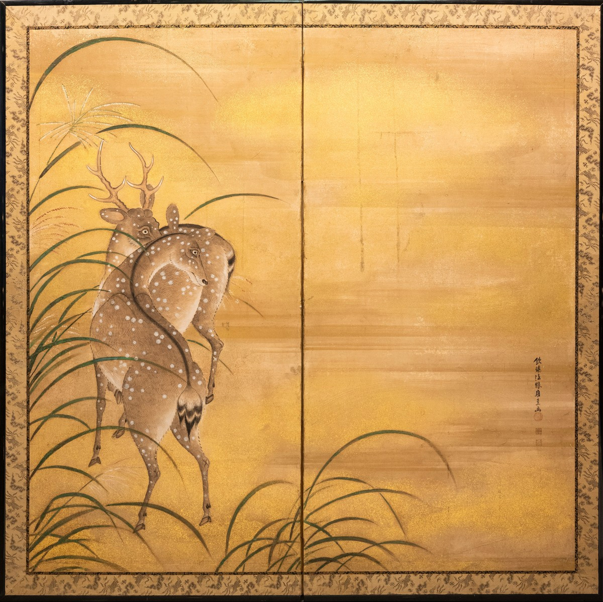 Paravento pieghevole a due pannelli con cervi su fondo dorato