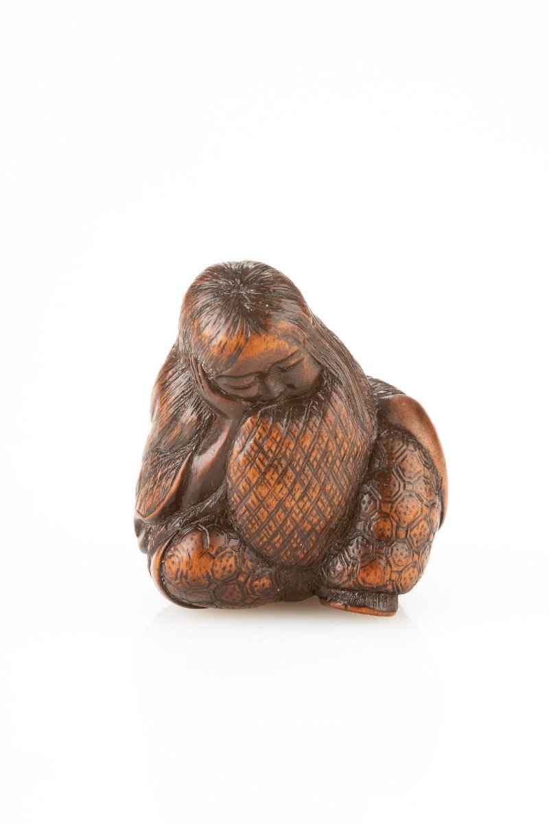 Netsuke en buis représentant Shojo