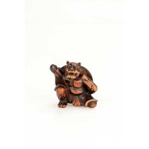 Netsuke in legno di bosso raffigurante un Oni e la festa di Setsubun