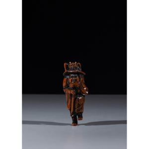 Netsuke in legno di bosso raffigurante Shoki con Oni