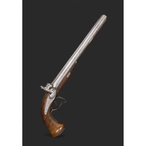 A Percussion Pistol With A Double Barrel Of Considerable Length. Circa 1850.