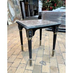 A Molded And Carved Wooden Table Lacquered Black And Gold, With A Square Marble Top