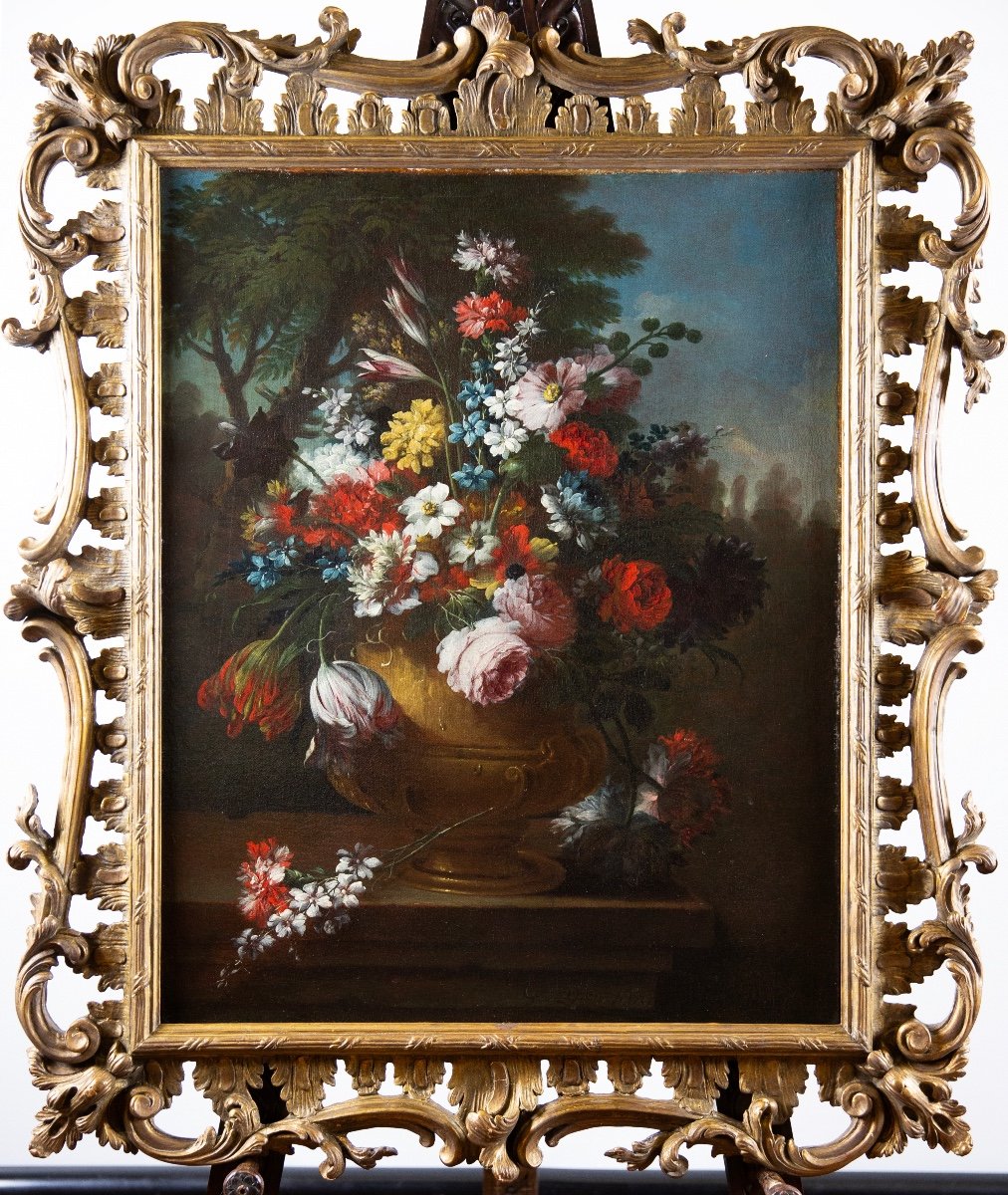 “Natura morta di fiori in un giardino”.Firmato e datato sul davanzale: “G. Lopez f. 1732“