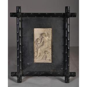 Diana Disarming Cupid, 19th-century Ivorine Bas-relief