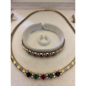 Set In 18-carat (750/1000)yellow And White Gold Set With Precious Stones: Rubies, Sapphires,