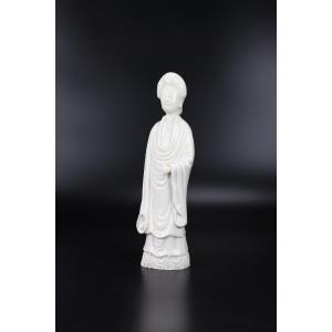A Chinese Dehua Blanc De Chine Standing Figure Of A Lady With European Hairstyle, Kangxi Period