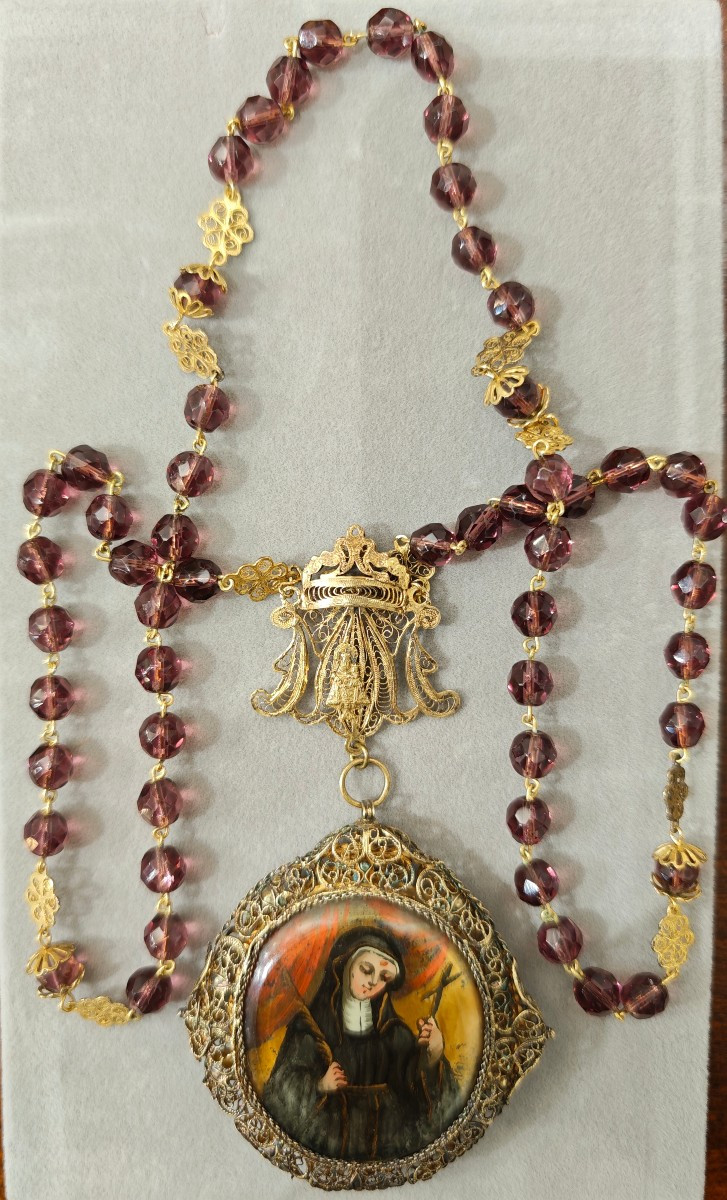 Rosario con Santa Rita in filigrana di argento del XIX secolo 