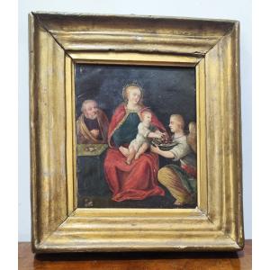 Olio su rame, inizi XVII secolo – Madonna col Bambino, San Giuseppe e angelo con simboli della 