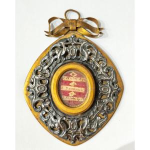 Antico reliquiario ovale in bronzo dorato e argento Stato Pontificio Roma XIX secolo