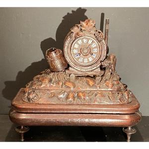 Carved Walnut Clock, 19th Century.