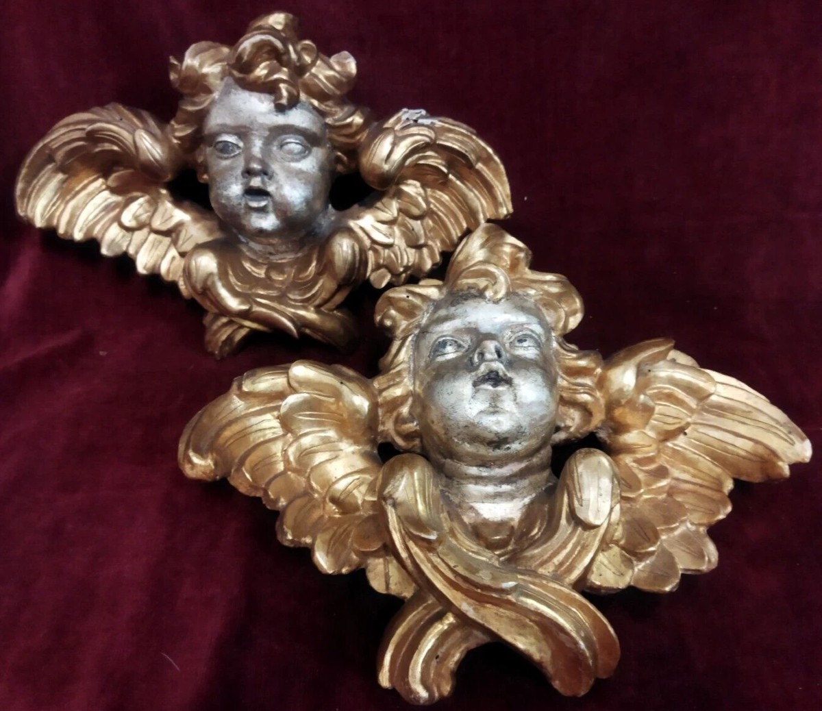 COPPIA ANGELI in legno intagliato, dorato e argentato del XVIII SECOLO