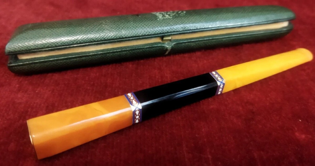BOCCHINO SIGARETTA per donna  Art Deco in bachelite e oro, con smalti astuccio ISAKOF Parigi