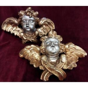 COPPIA ANGELI in legno intagliato, dorato e argentato del XVIII SECOLO
