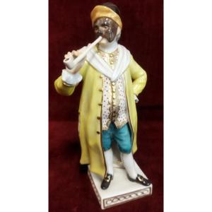 COMMEDIA DELL' ARTE ITALIANA  STATUINA CORTEGGIANO IN PORCELLANA DIPINTA MEISSEN - XX SECOLO