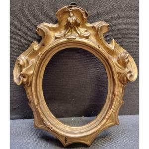 PICCOLA CORNICE IN LEGNO INTAGLIATO E DORATO - DELL'700